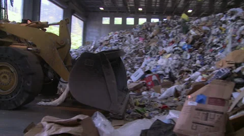 Plow pushing heap of trash (6 of 10) Stock Footage 32283658