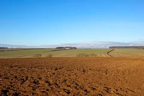 Plow soil in winter Stock Photos