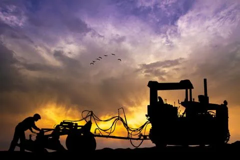 Plow at sunset Stock Illustration