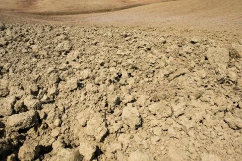 Plowed field ready to be cultivated in Val d'Orcia, Tuscany Stock Photos