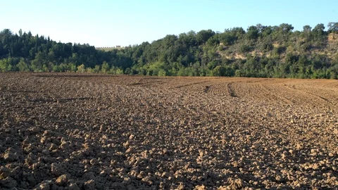 Plowed field at sunset Stock Footage 95928241