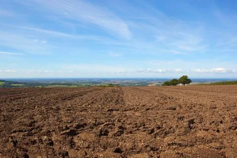 Plowed hillside field Stock Photos