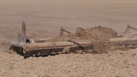 Plowing of empty field by tractor, preparing seeding season Stock Footage 126781787