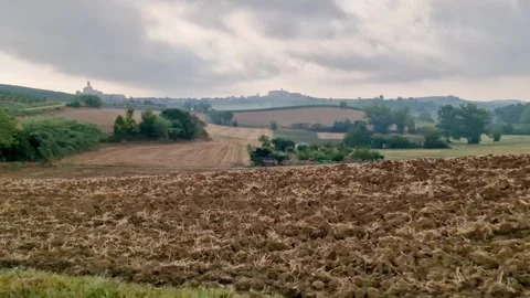 Plowing Field and Rolling Hills in Rural Monferrato Countryside, Italy Stock Footage 343581489