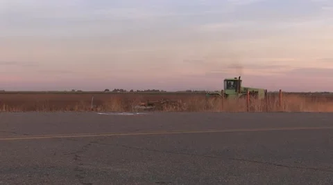 Plowing up a field Video stock 43330189