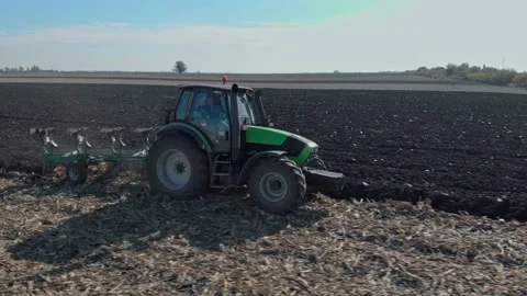 Plowing a field Stock Footage 171571243