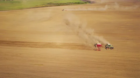 Plowing field with Tractor , drone view. Cultivated and soil tillage. Видео 167040482