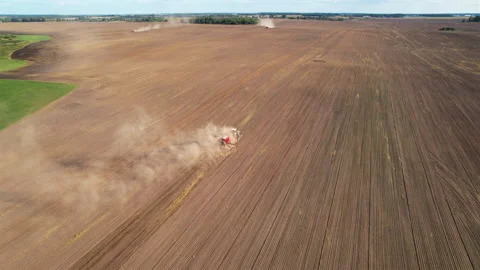 Plowing field with Tractor , drone view. Cultivated and soil tillage. Video stock 167040723