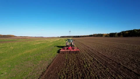 Plowing field with Tractor , drone view. Cultivated and soil tillage. 스톡 동영상 167041632