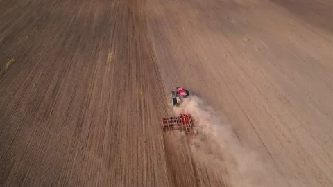 Plowing field with Tractor , drone view. Cultivated and soil tillage. 스톡 동영상 167383973