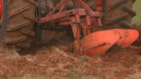 Plowing a field with a tractor Stock Footage 120112238