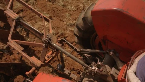 Plowing a field with a tractor Stock Footage 120112331