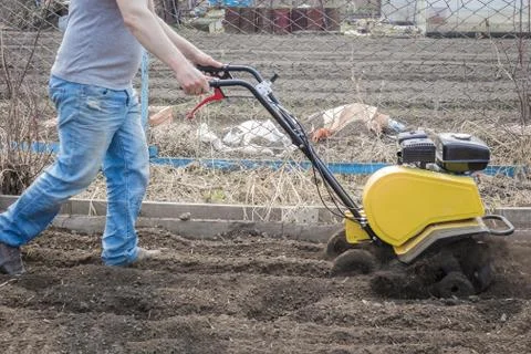 Plowing by hand plow. Stock Photos