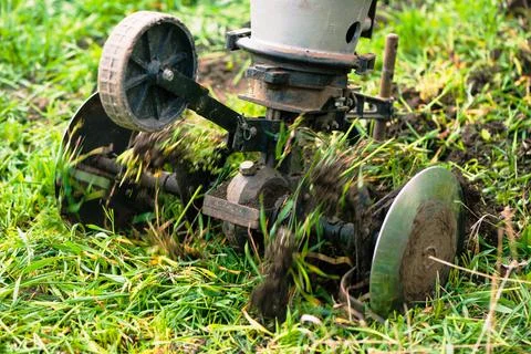 Plowing machine working with soil Foto stock