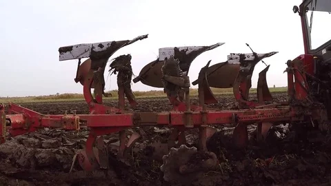 Plowing of paprika field on cloudy fall day. Dolly gimbal video. Stock Footage 84177519