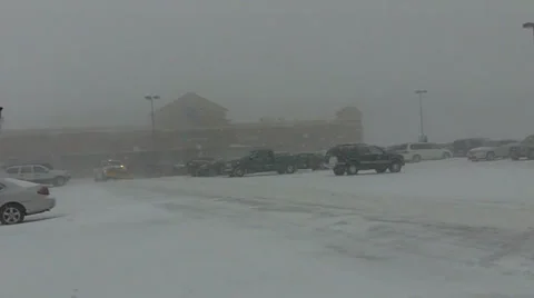 Plowing snow during a blizzard Stock Footage 34400262