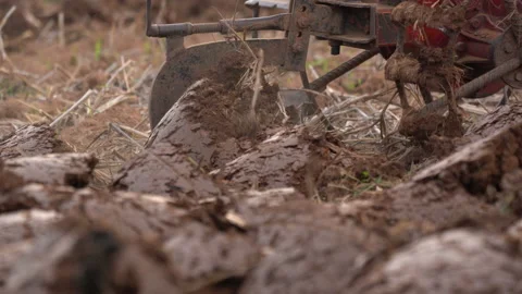 Plowing on soil of farmer in countryside Stock Footage 152862319
