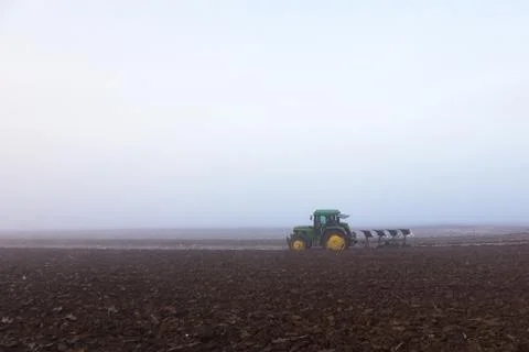 Plowing the soil in winter Stock Photos