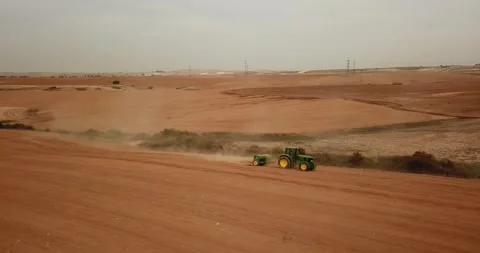 A plowing tractor in the field 動画素材 241320738