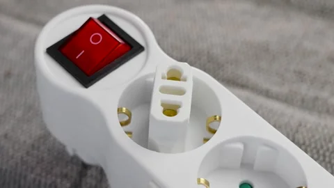 Plug adapter connected in an electrical splitter socket Stock Footage 247055002