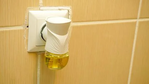 Plug in air purifier close up view Stock Photos
