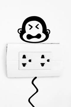 Plug and monkey picture. Stock Photos