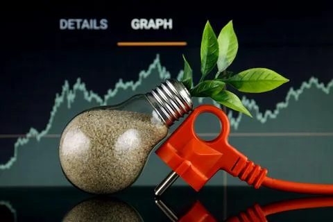 Plug and plant growing inside the light bulb. Green eco renewable energy co.. Stock Photos
