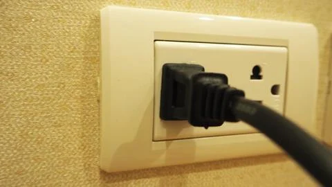 Plug and power outlet Stock Photos