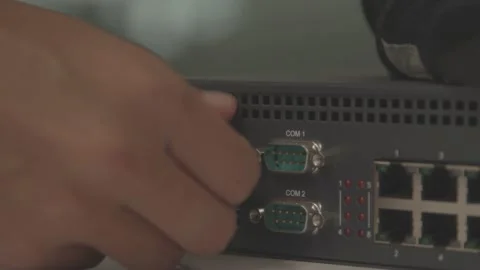 Plug in and Unplug Power Cable into Device Stock Footage 145429668