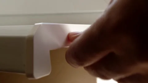 The plug is attached to the end of the window sill with glue. Construction works Stock Footage 252200505