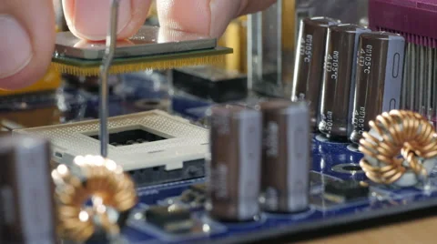 Plug in CPU microprocessor. Sliding shot Stock Footage 68907040