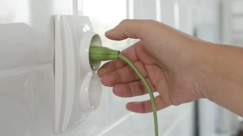 Plug in Electrical Cord in Socket, Plugging Devices, Electric Power View, Save Stock Footage 265656070