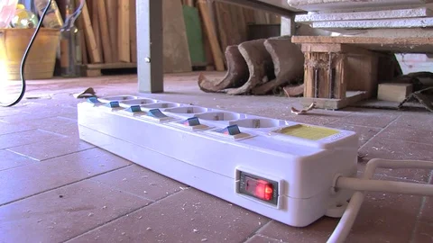 Plug inserted into the power strip for electricity Stock Footage 92548503