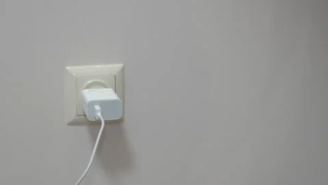 Plug in a mobile phone charger Stock-Footage 307540257