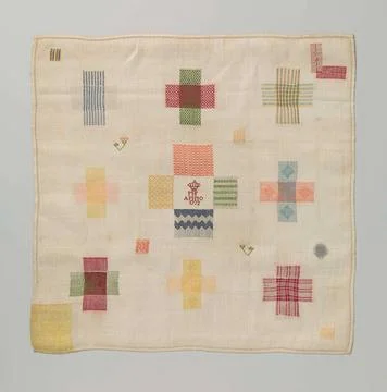 Plug of multicolored silk on linen .. Stop stack with multicolored embroid... Stock Photos
