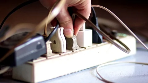 Plug in the one plug into the extended socket on the floor. Stock Footage 116881966