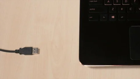 Plug phone to computer Stock Footage 71225262