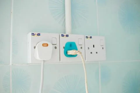 Plug the power plug with connected plugs Stock Photos