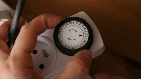 Plug-in security timer, Mechanical Switch Security Light Heater Stock Footage 122592066