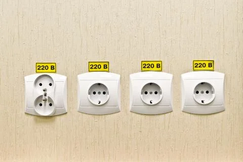 Plug socket 220 volt on the wall Stock Photos