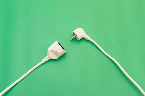 Plug socket on green background Stock Photos