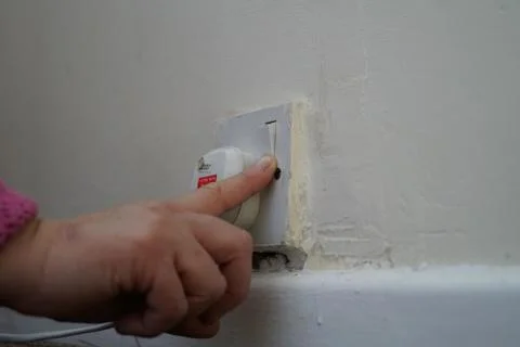 Plug switched on Stock Photos