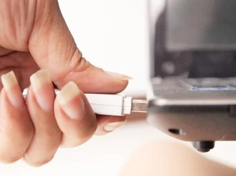 Plug the thumb drive Stock Photos