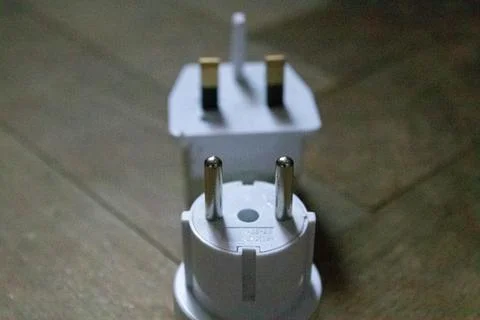 Plug top view close up EU and UK Stock Photos