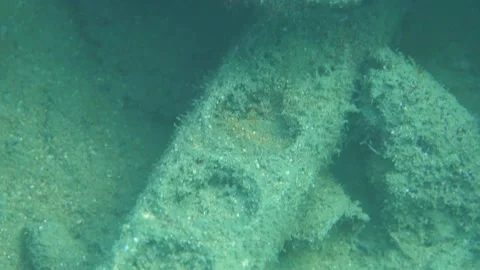 A Plug Trash on the Sea Floor, Close Up, Underwater Shot Stock Footage 145898952