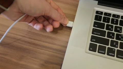 Plug / unplug USB cable to laptop. USB connection, socket closeup Stock Footage 72624560