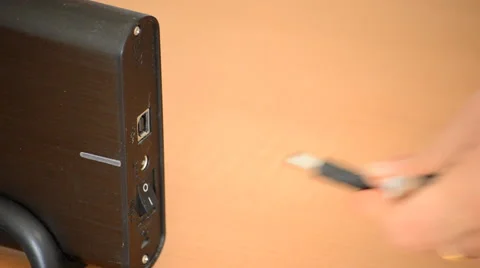 Plugging In And Turning On External Hard Drive Vídeo Stock 50579666