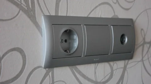 Plugging and unplugging a power adapter. Stock Footage 59089528