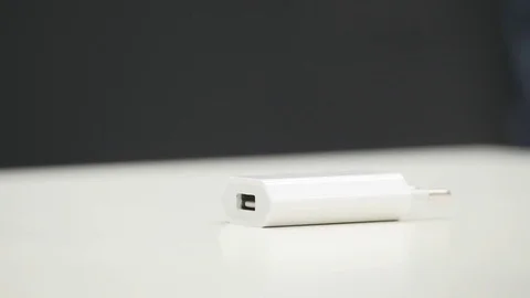 Plugging and unplugging a power adapter. Stock Footage 85190430