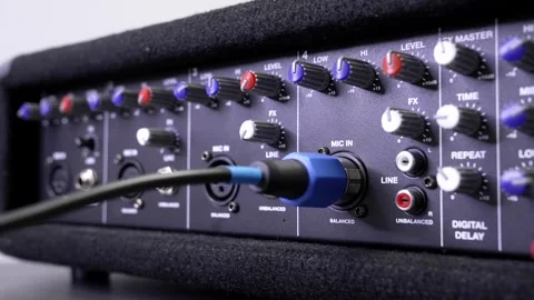 Plugging Audio Cables into Sound Mixer Interface Stock Footage 310139247